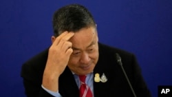 FILE - Thailand's Prime Minister Srettha Thavisin talks to media during a news conference at the government house in Bangkok, April 10, 2024. 