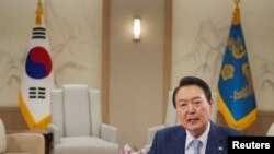 FILE - South Korean President Yoon Suk-yeol speaks at an interview with Reuters in Seoul, South Korea, Nov.r 28, 2022.