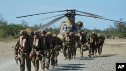 FILE - U.S. troops are seen at Pasuquin, Ilocos Norte province, as U.S. and Philippine troops participate in a joint military exercise in the Philippines on May 6, 2024. U.S. and Filipino troops concluded a new combat exercise in the Philippines on June 10, 2024.
