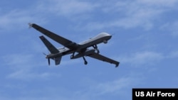 资料照：美国空军MQ-9“收割者”侦察机在一次演习中飞行。