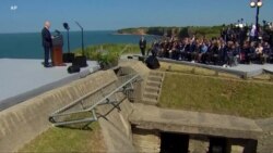 Biden presses for unity on Ukraine at hallowed WWII battleground