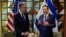 US Secretary of State Antony Blinken, left, and Israeli President Isaac Herzog talk in Tel Aviv, Israel, May 1, 2024.
