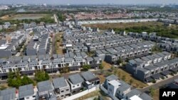 ILUSTRASI - Kompleks perumahan warga di pinggiran kota Jakarta. (BAY ISMOYO / AFP)