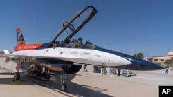 US Air Force Secretary Frank Kendall sits in the front cockpit of an X-62A VISTA aircraft at Edwards Air Force Base, Calif., on May 2, 2024.