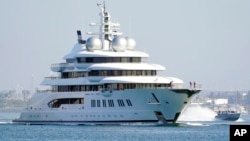 FILE - The superyacht Amadea sails into the San Diego Bay, June 27, 2022, The G7 said Friday it reached an agreement to provide a loan of around $50 billion to Ukraine. The loan will be repaid with the interest generated by Russian assets seized and frozen after the war started.