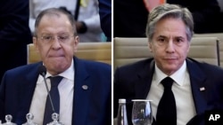 Menteri Luar Negeri Rusia Sergey Lavrov(kiri) dan Menteri Luar Negeri AS Antony Blinken(kanan) pada pertemuan G20 di New Delhi, India, 2 Maret 2023.