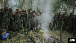 Basoda ba mampinga ma RDC (FARDC) na nzamba mpo na kobundisa eleongo batomboki ba ADF na parc ya national ya Virunga, Nord-Kivut, 14 décembre 2021.