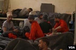 Arhiva - Zatvoreni pripadnici Islamske države u zatvoru u Hasaki, Siria, 21. novembra 2019.