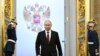 Vladimir Putin tiba untuk upacara pelantikannya sebagai presiden Rusia di Istana Grand Kremlin, Moskow, Rusia, Selasa, 7 Mei 2024. (Sergei Bobylev, Sputnik, Kremlin Pool Photo via AP)