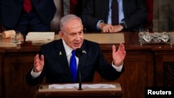 Perdana Menteri Israel Benjamin Netanyahu berpidato pada pertemuan gabungan Kongres di US Capitol di Washington, AS, 24 Juli 2024. (REUTERS/Kevin Mohatt)