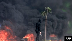 巴勒斯坦人在西岸占领区犹太定居点附近同以色列军人发生冲突。（2023年10月13日）