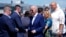 President Joe Biden, center, and first lady Jill Biden, second right, arrive on Air Force One at Harrisburg International Airport to attend a campaign rally in Harrisburg, Pennsylvania, July 7, 2024.