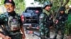 FILE - Tentara Tentara Pembebasan Nasional Karen (KNLA) bersiap untuk berpatroli di Myawaddy, kota perbatasan Thailand-Myanmar di bawah kendali koalisi pasukan pemberontak yang dipimpin oleh Persatuan Nasional Karen, di Myanmar, 15 April 2024. (REUTERS/Athit Perawongmetha)