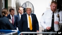 Former President Donald Trump arrives at Manhattan Criminal Court in New York, May 29, 2024.