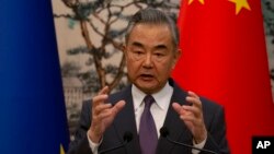 Chinese Foreign Minister Wang Yi and EU foreign policy chief Josep Borrell, unseen, attend a press conference following the EU-China High-Level Strategic Dialogue, in Beijing, Oct. 13, 2023.