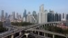 FILE - An aerial view shows highways and buildings in Shanghai, China, March 30, 2022. Picture taken with a drone.