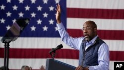 U.S. Senator Raphael Warnock, a Democrat from Georgia, speaks before U.S. President Joe Biden at a campaign rally at Pullman Yards in Atlanta, Georgia, March 9, 2024.