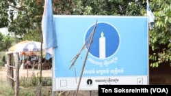 FILE - The Candlelight Party banner is seen along a national road in Run Ta Ek commune of Banteay Srey District, Siem Reap province, on Feb. 12, 2023. (Ten Soksreinith/VOA Khmer)