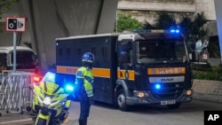 A prison van carrying activist publisher Jimmy Lai arrives at the West Kowloon Magistrates' Courts, where Lai's trial takes place, in Hong Kong, Jan. 2, 2024. 