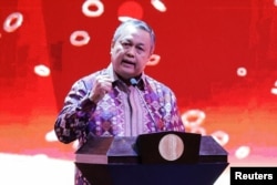 Gubernur Bank Indonesia Perry Warjiyo berbicara dalam pertemuan tahunan dengan pemangku kepentingan keuangan di Jakarta, 30 November 2022. (Foto: REUTERS/Willy Kurniawan)