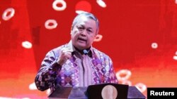 FILE: Gubernur Bank Indonesia Perry Warjiyo dalam pertemuan tahunan Bank Sentral Indonesia dengan pemangku kepentingan keuangan di Jakarta, 30 November 2022. (REUTERS/Willy Kurniawan)