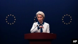 FILE - European Commission President Ursula von der Leyen speaks during a press conference at the European Union Delegation to China compound after meeting with Chinese President Xi Jinping and Premier Li Qiang in Beijing, Dec. 7, 2023.