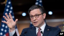 Speaker of the House Mike Johnson speaks at the Capitol in Washington, March 20, 2024.