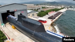 북한이 지난 2023년 9월 8일 김정은 국무위원장이 참석한 가운데 진행된 '김군옥영웅함' 건조식 사진을 공개했다.