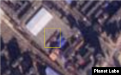11월 20일 단둥 세관 야적장을 촬영한 위성사진에 트럭의 행렬이 만들어 낸 것으로 보이는 대형 물체(사각형 안)가 포착됐다. 사진=Planet Labs