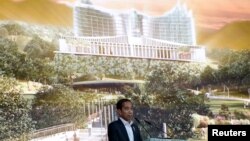 Presiden Joko Widodo memaparkan kemajuan pembangunan Ibu Kota Nusantara (IKN) dalam acara Pekan Ecosperity di Singapura, Rabu, 7 Juni 2023. (Foto: Edgar Su/Reuters)