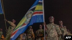 Wanajeshi wa Sudan Kusini wakijiandaa kuondoka katika uwanja wa ndege wa Goma December 8, 2023. Picha na Guerchom Ndebo / AFP.