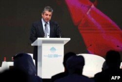 FILE - Masrour Barzani, Prime Minister of Iraqi Kurdistan's regional government, speaks during an energy forum in Dubai on March 28, 2022. Barzani traveled to Dubai on Nov. 30, 2023, to attend the U.N. Conference of the Parties, or COP28.