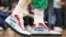 FILE - Enes Kanter Freedom wore these shoes urging that China not host the 2022 Winter Olympic Games when the Boston Celtics hosted the Chicago Bulls in Boston, Nov 1, 2021.