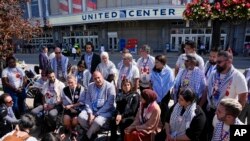 Uncommitted delegates hold a press conference outside the United Center before the Democratic National Convention, Aug. 22, 2024, in Chicago.