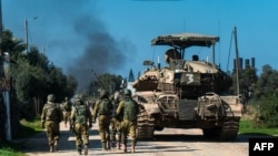 Israeli soldiers operate in the Gaza Strip on Jan. 28, 2024, amid ongoing battles between Israel and the Palestinian militant group Hamas. (Photo by Israeli Army/AFP)
