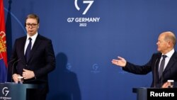 Nemački kancdelar Olaf Šolc i predsednik Srbije Aleksandar Vučić na zajedničkoj konferenciji za medije u Berlinu (foto: Reuters)