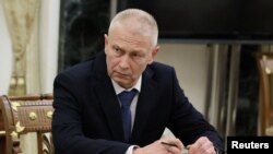 Senior former commander of the Wagner mercenary group Andrei Troshev attends a meeting with Russian President Vladimir Putin, not pictured, in Moscow, Russia, Sept. 28, 2023. (Sputnik/Mikhail Metzel/Pool via Reuters)