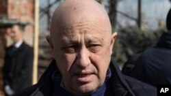 FILE - Yevgeny Prigozhin, the owner of the Wagner Group military company, arrives during a funeral ceremony at the Troyekurovskoye cemetery in Moscow, Russia, on April 8, 2023.