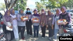 Aksi solidaritas Gerakan Perempuan Bersatu untuk mendukung kesembuhan anak yang menjadi korban kekerasan seksual di Parigi Moutong. (Courtesy: GPB).