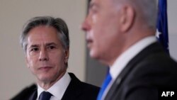 Perdana Menteri Israel Benjamin Netanyahu (kanan) bersama Menteri Luar Negeri AS Antony Blinken di Tel Aviv pada 12 Oktober 2023. (Foto: AFP)