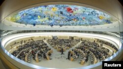 FILE - Overview of the Human Rights Council at the United Nations in Geneva, Sept. 12, 2022. Picture taken with a fish-eye lens.