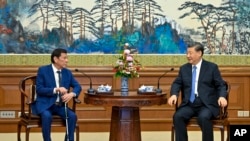 中国国家主席习近平2023年7月17日在北京会见菲律宾前总统杜特尔特（Rodrigo Duterte）（美联社）