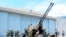 Taiwanese soldiers operate a Oerlikon 35mm twin cannon anti-aircraft gun at a base in Taiwan's southeastern Hualien county on Aug. 18, 2022.