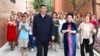 FILE - In this photo released by China's Xinhua News Agency, Chinese President Xi Jinping, center, visits the community of Guyuanxiang in the Tianshan District in Urumqi in northwestern China's Xinjiang Uyghur Autonomous Region, July 13, 2022. 