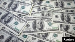 ARHIVA - Američki dolar (Foto:Reuters/Lee Jae-Won)