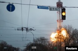 A blast is seen at a TV tower, amid Russia's invasion of Ukraine, in Kyiv, March 1, 2022.