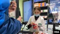 One pharmacist say she has no bandages and is running very low on antibiotics. Another has no painkillers of any description or strength. (Jamie Dettmer/VOA)