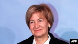 FILE - Teresa Ribeiro, who was then Portuguese state secretary for European affairs, arrives for the opening of a Mideast peace conference in Paris, Jan. 15, 2017.