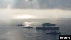 Kapal Ronald Reagan Strike Group adalah kapal induk USS Ronald Reagan. Kapal induk USS Ronald Reagan akan mengunjungi Busan, kota di bagian selatan, (Foto: Angkatan Laut AS via Reuters)