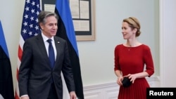 U.S. Secretary of State Antony Blinken leads the way for Estonian Prime Minister Kaja Kallas during their meeting at the Stenbock House in Tallinn, Estonia March 8, 2022. (Olivier Douliery/Pool via Reuters)